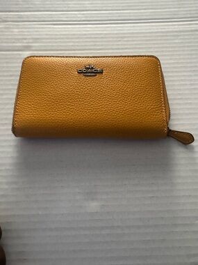 Coach Mustard Pebbled Leather Continental Wallet
